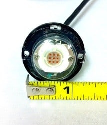 Button Strobe With Ruler Measuring Underneath